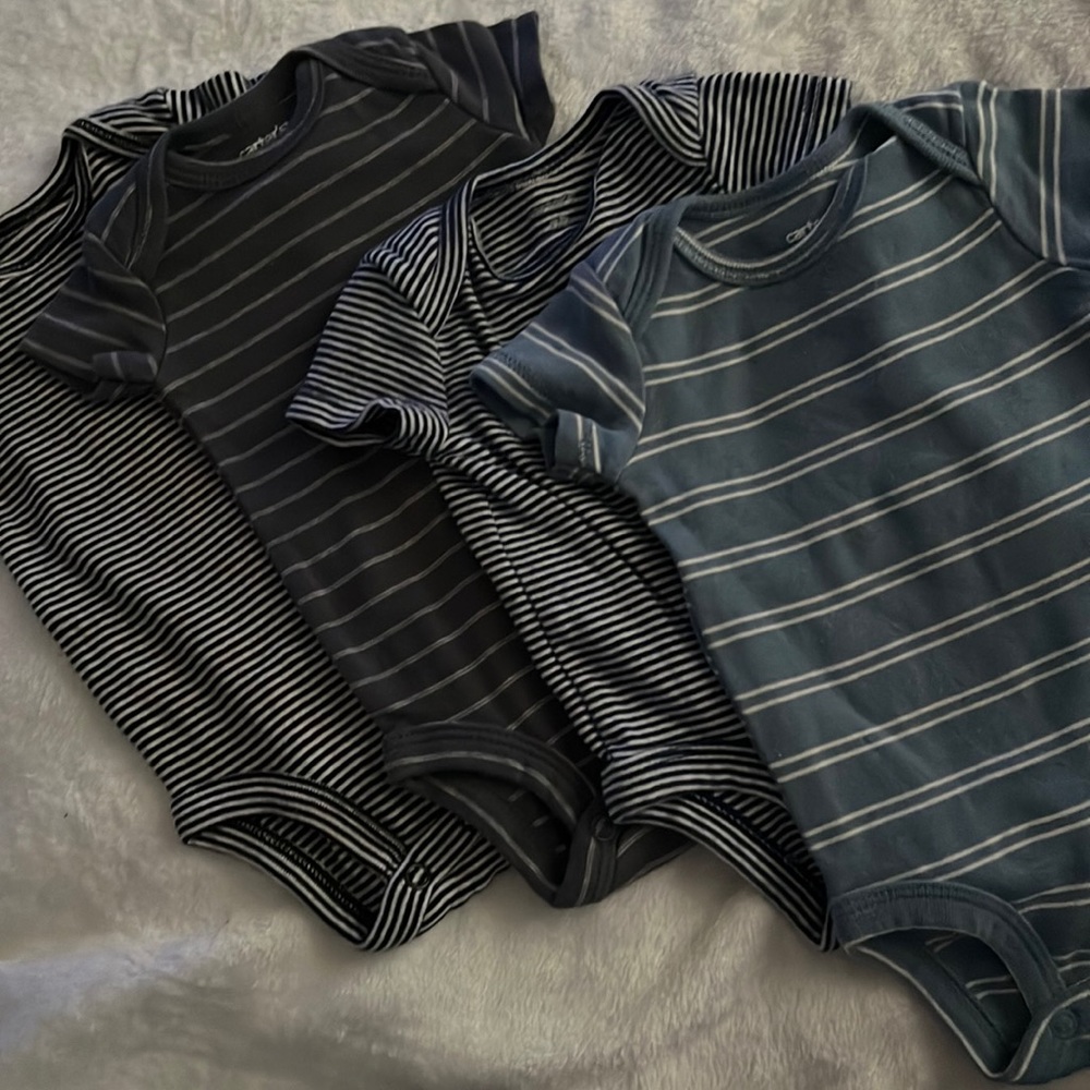 different colored stripped onesies